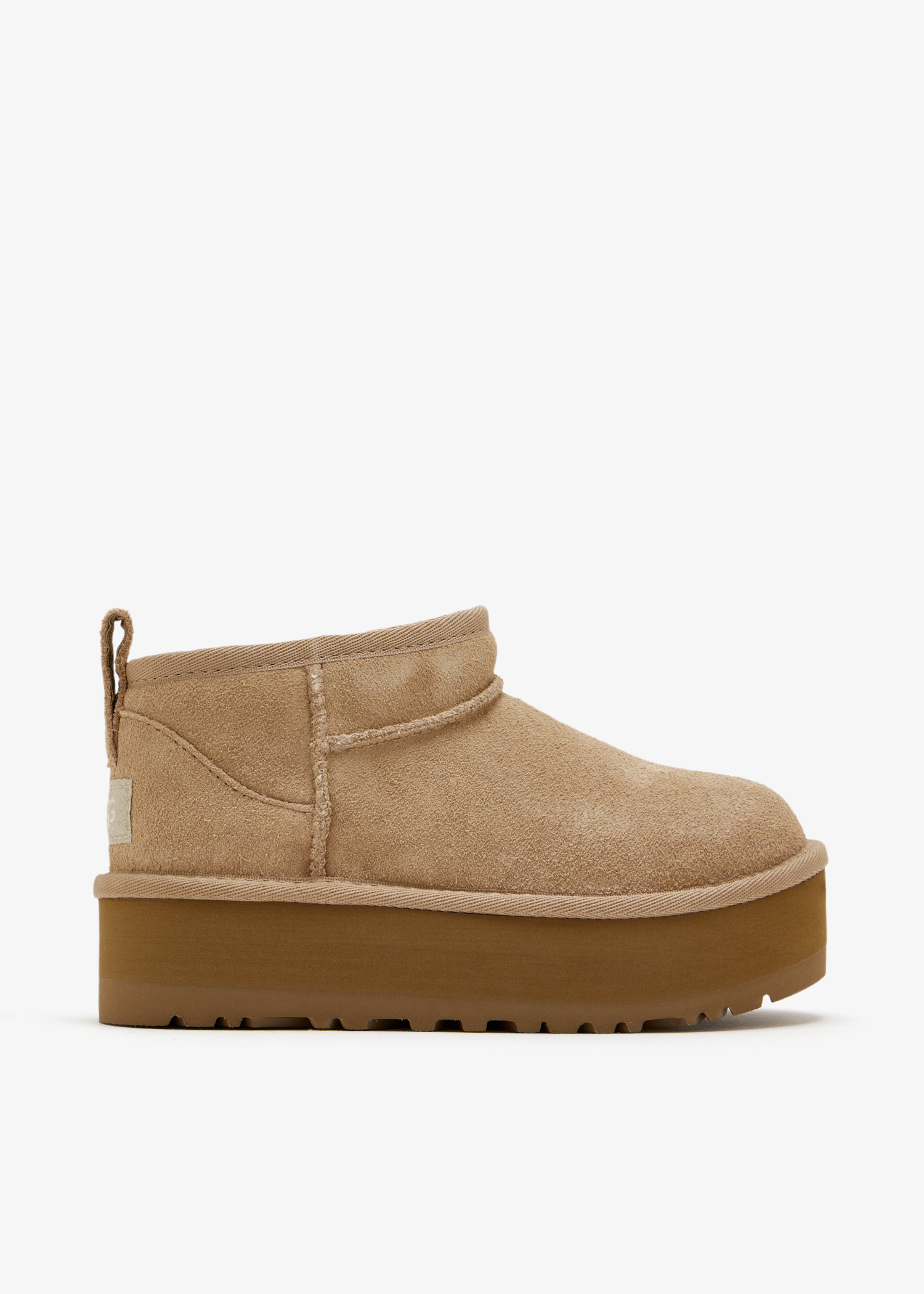 Classic Ultra Mini platform boots, Beige
Classic Ultra Mini platform boots, Beige