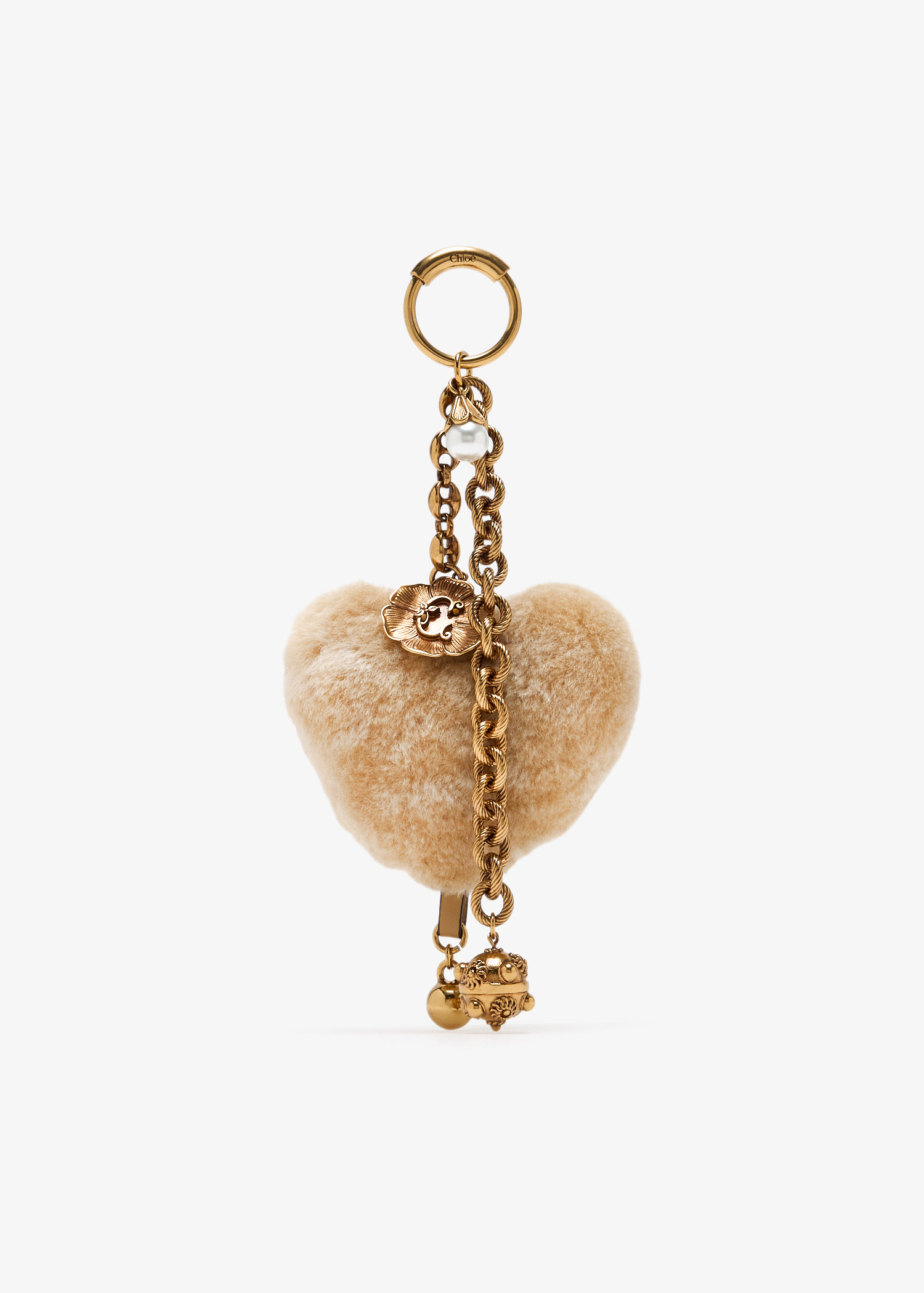 Symbols Heart Shearling bag charm, Beige
Symbols Heart Shearling bag charm, Beige