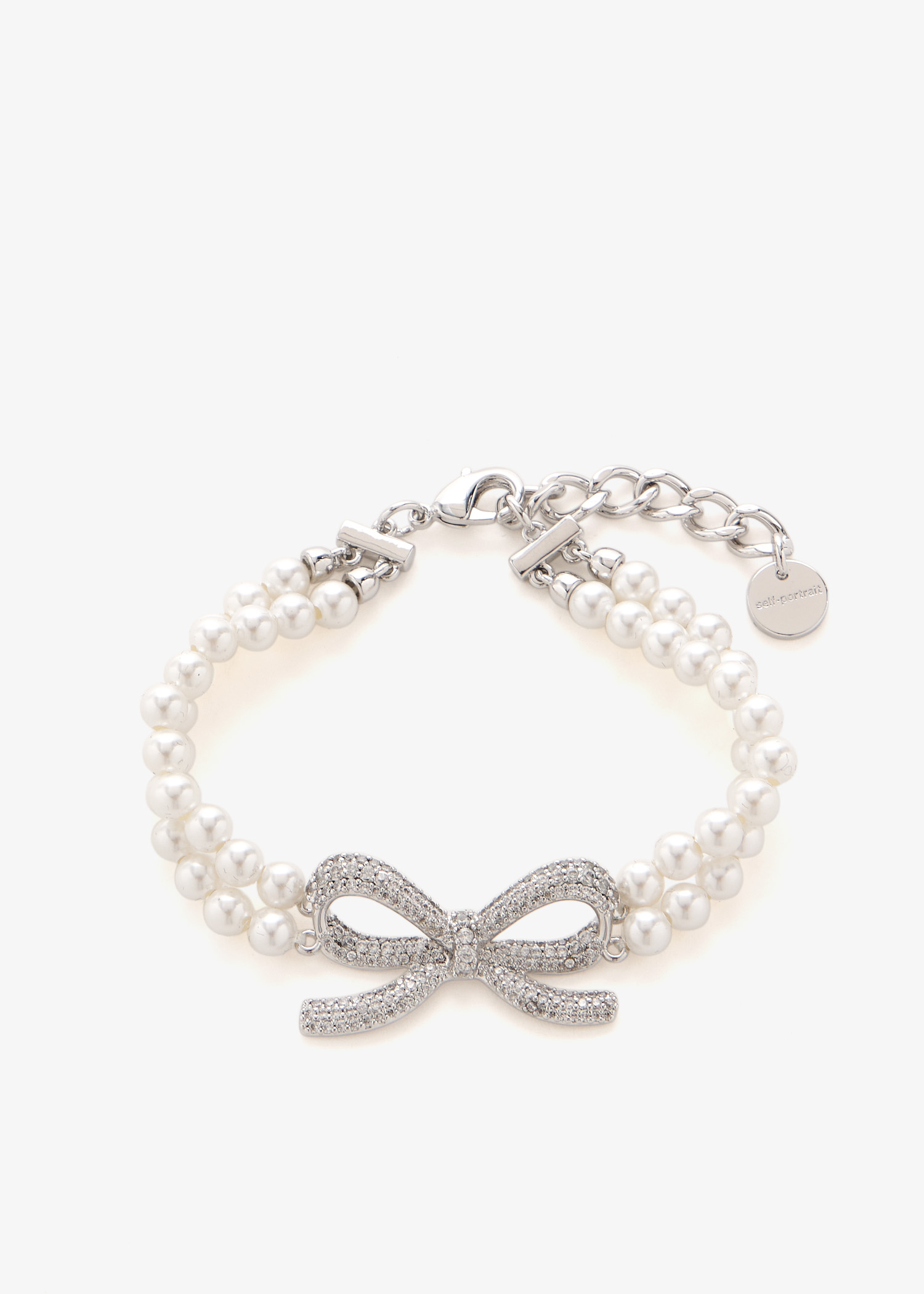 Double Pearl bow bracelet, White
Double Pearl bow bracelet, White