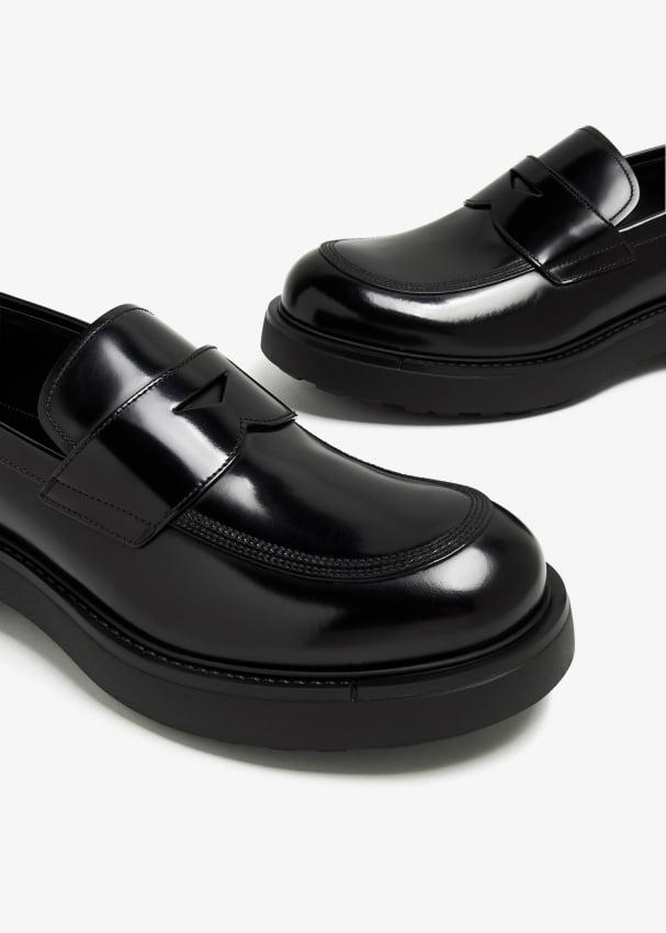 Prada Brushed leather loafers for Men - Black in UAE | Level Shoes