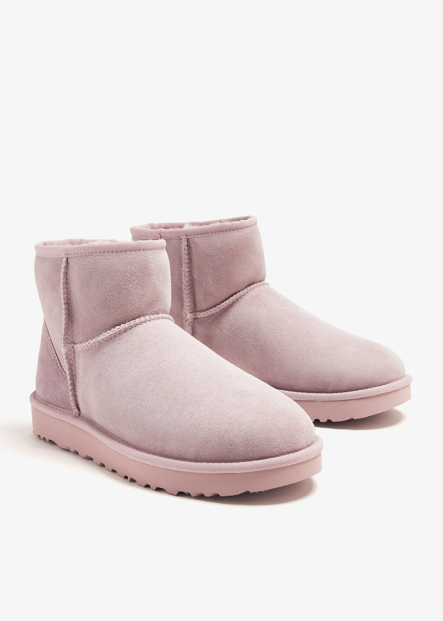 UGG Classic Mini II boots for Women - Pink in UAE | Level Shoes