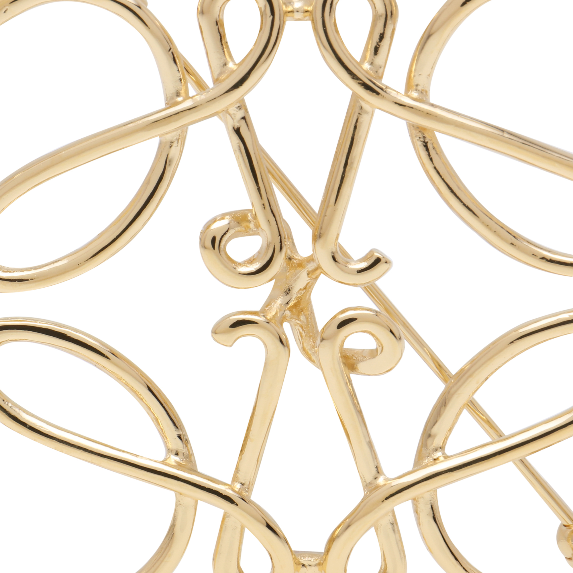 

Anagram brooch, Gold