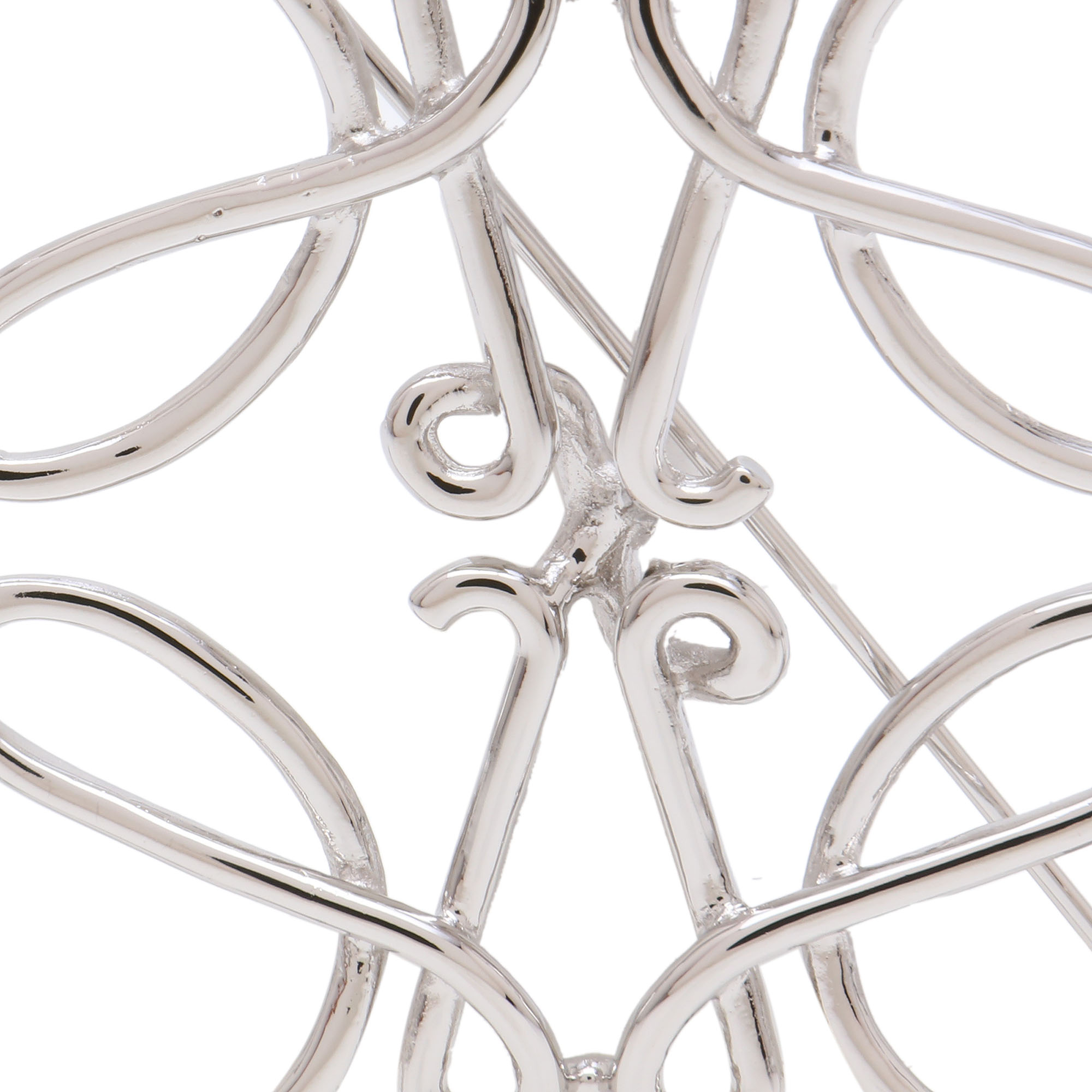 

Anagram brooch, Gold