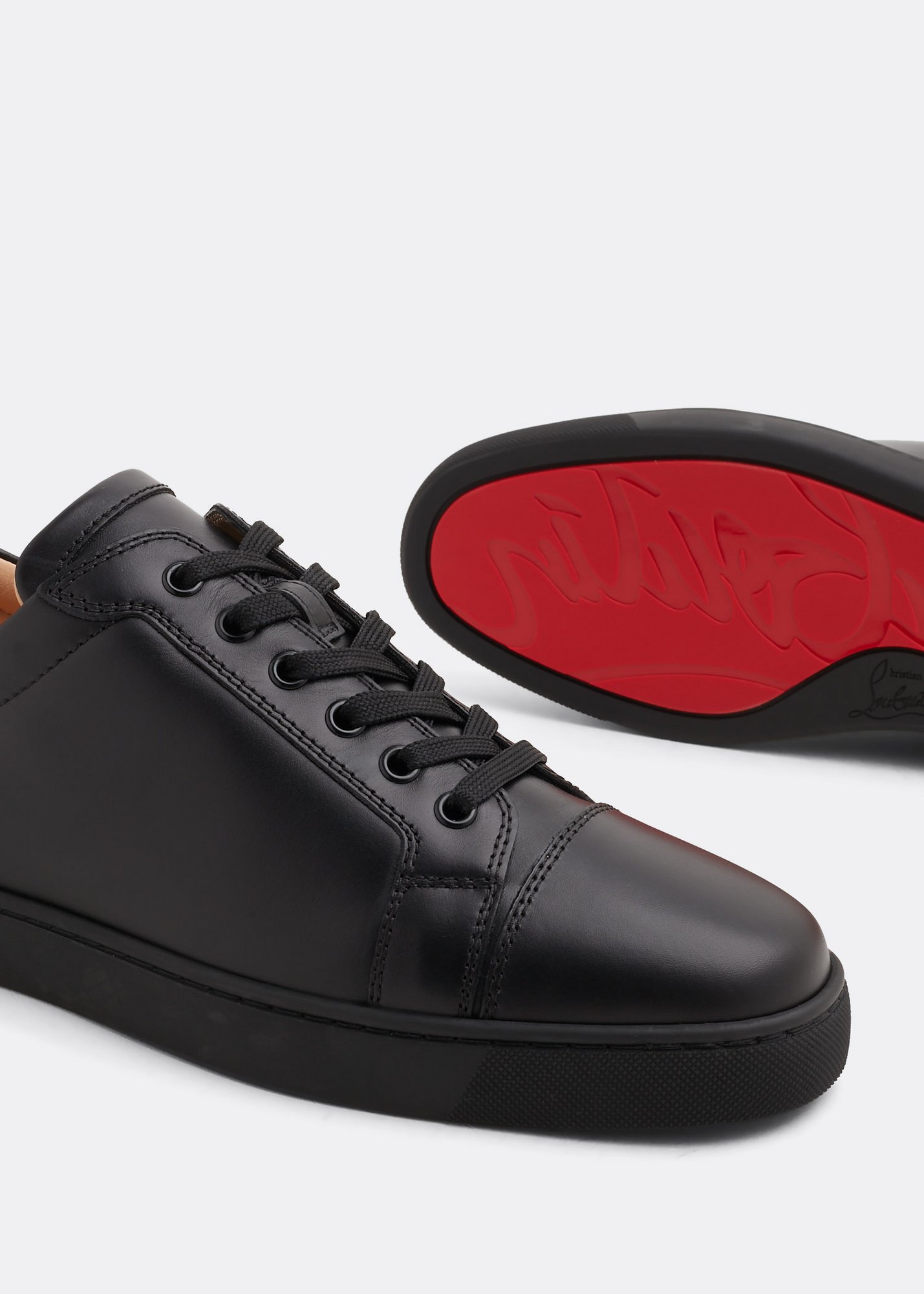 Louboutin junior black 2025