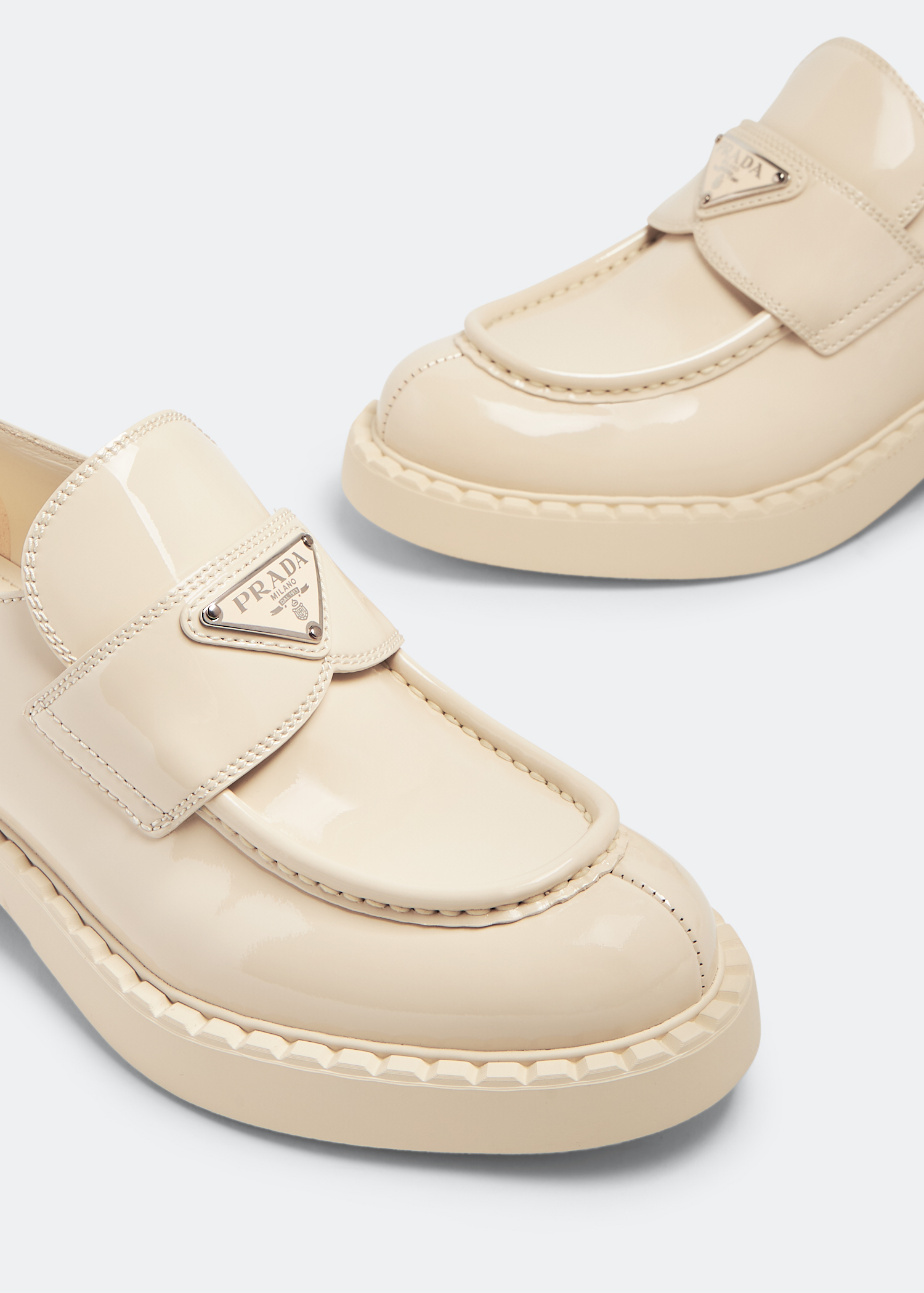 

Chocolate patent leather loafers, Beige