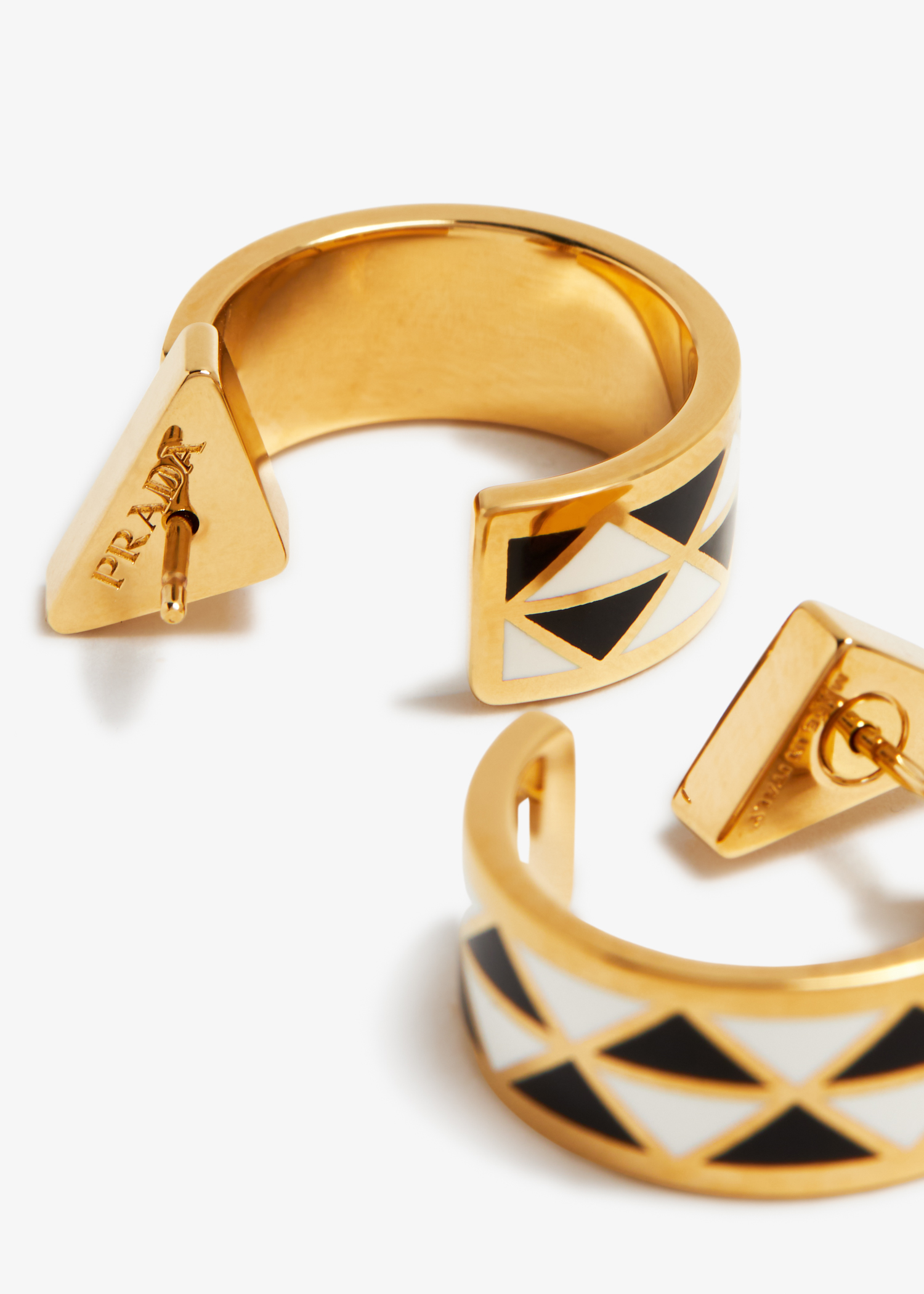 

Enamelled metal earrings, Prints