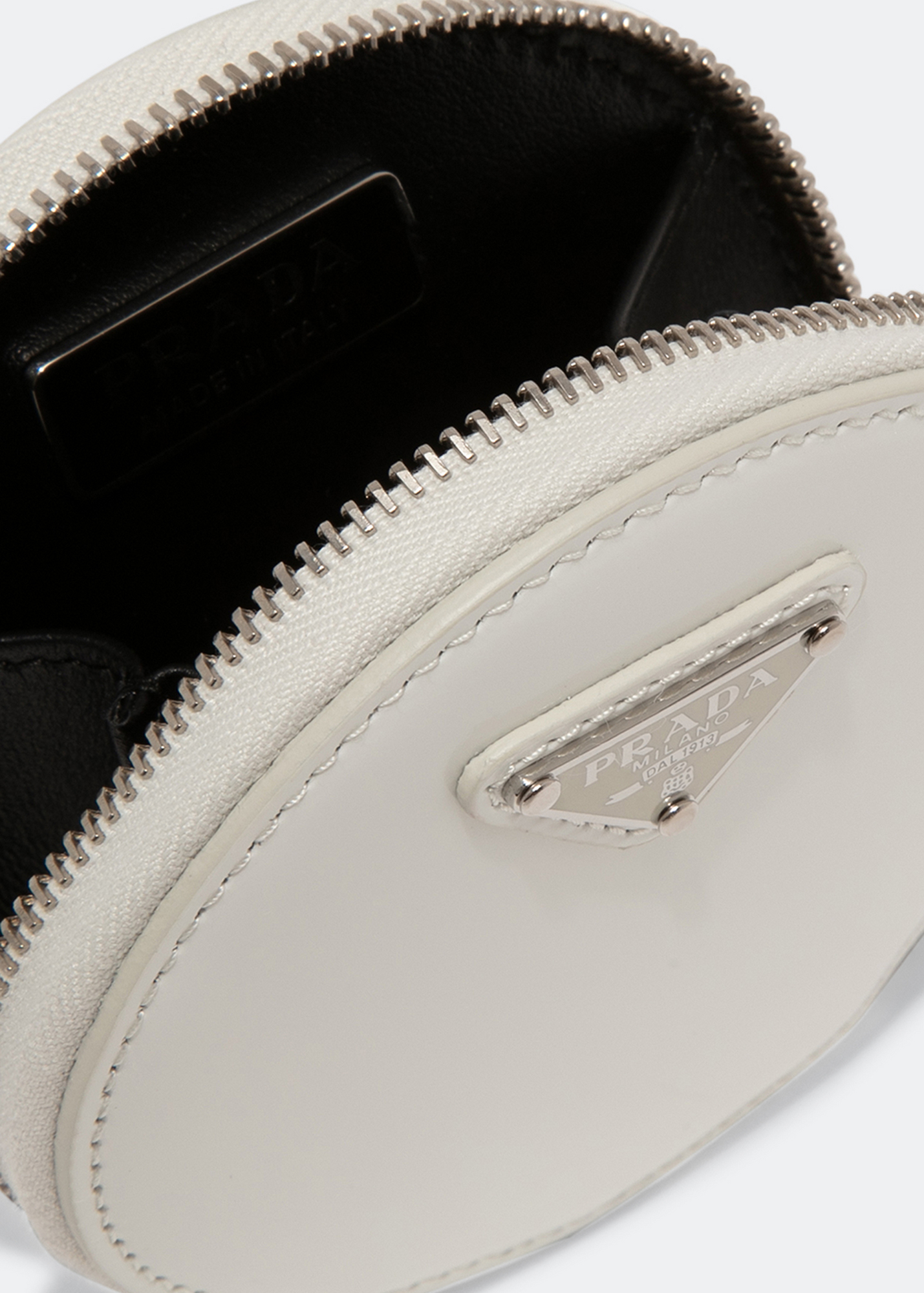 

Brushed leather round mini-pouch, White