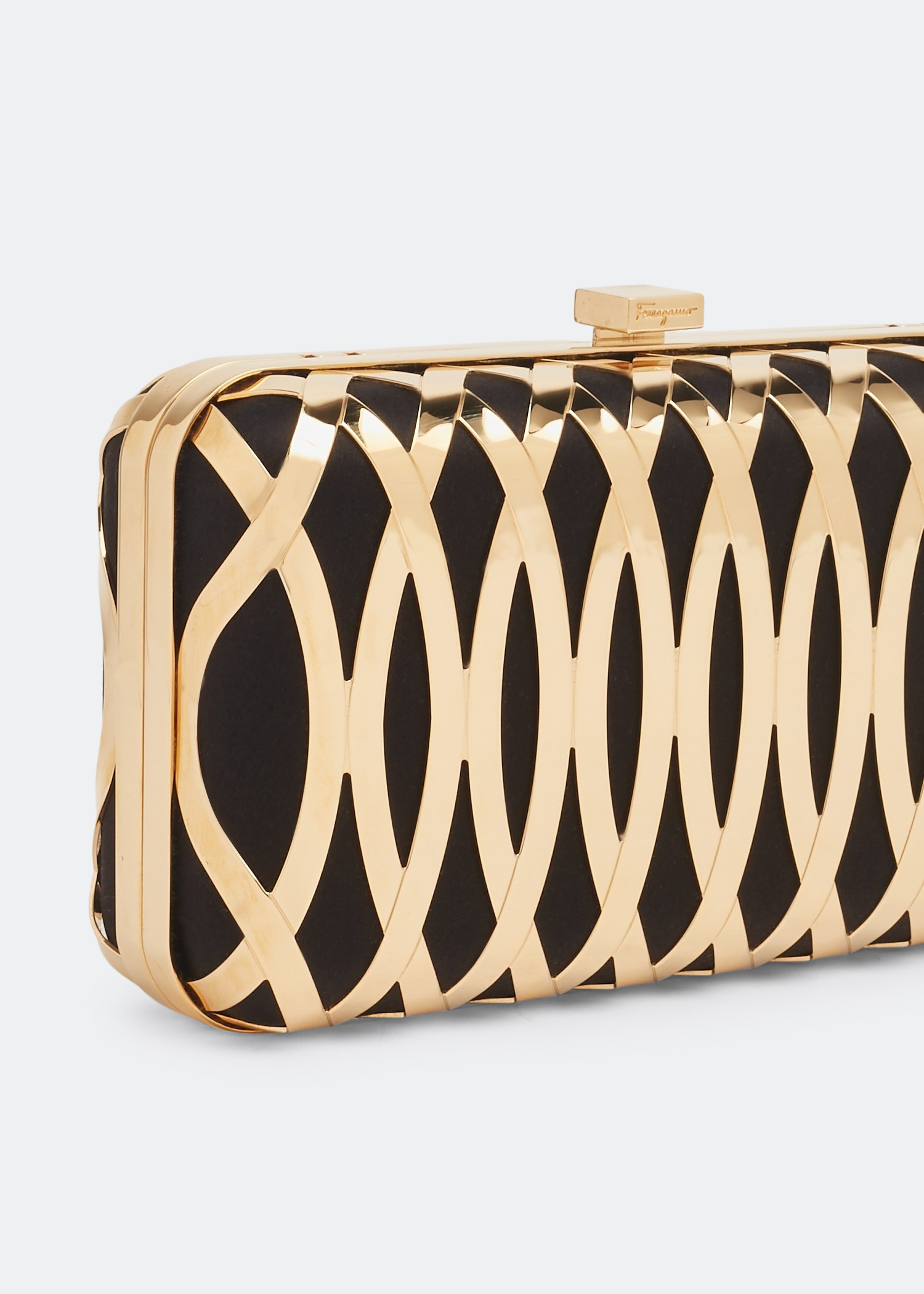 

Caged clutch, Gold