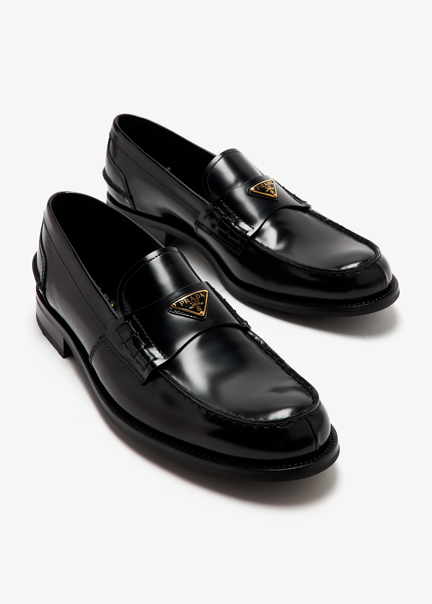 Prada Brushed leather loafers for Men - Black in UAE | Level Shoes