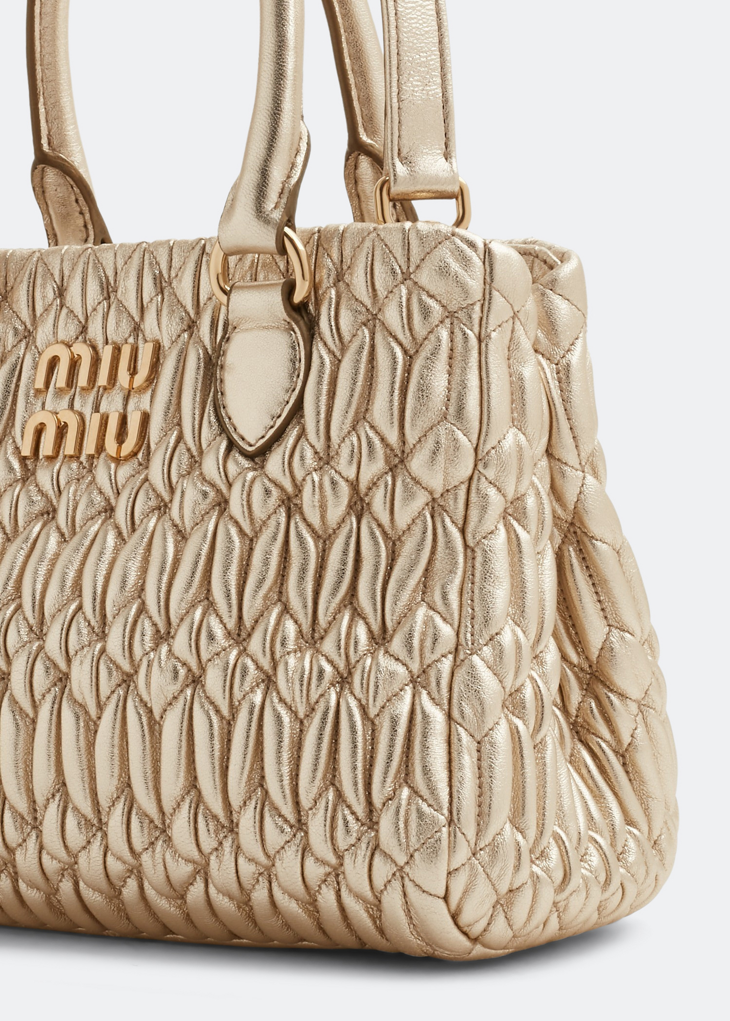 

Matelassé top handle bag, Gold