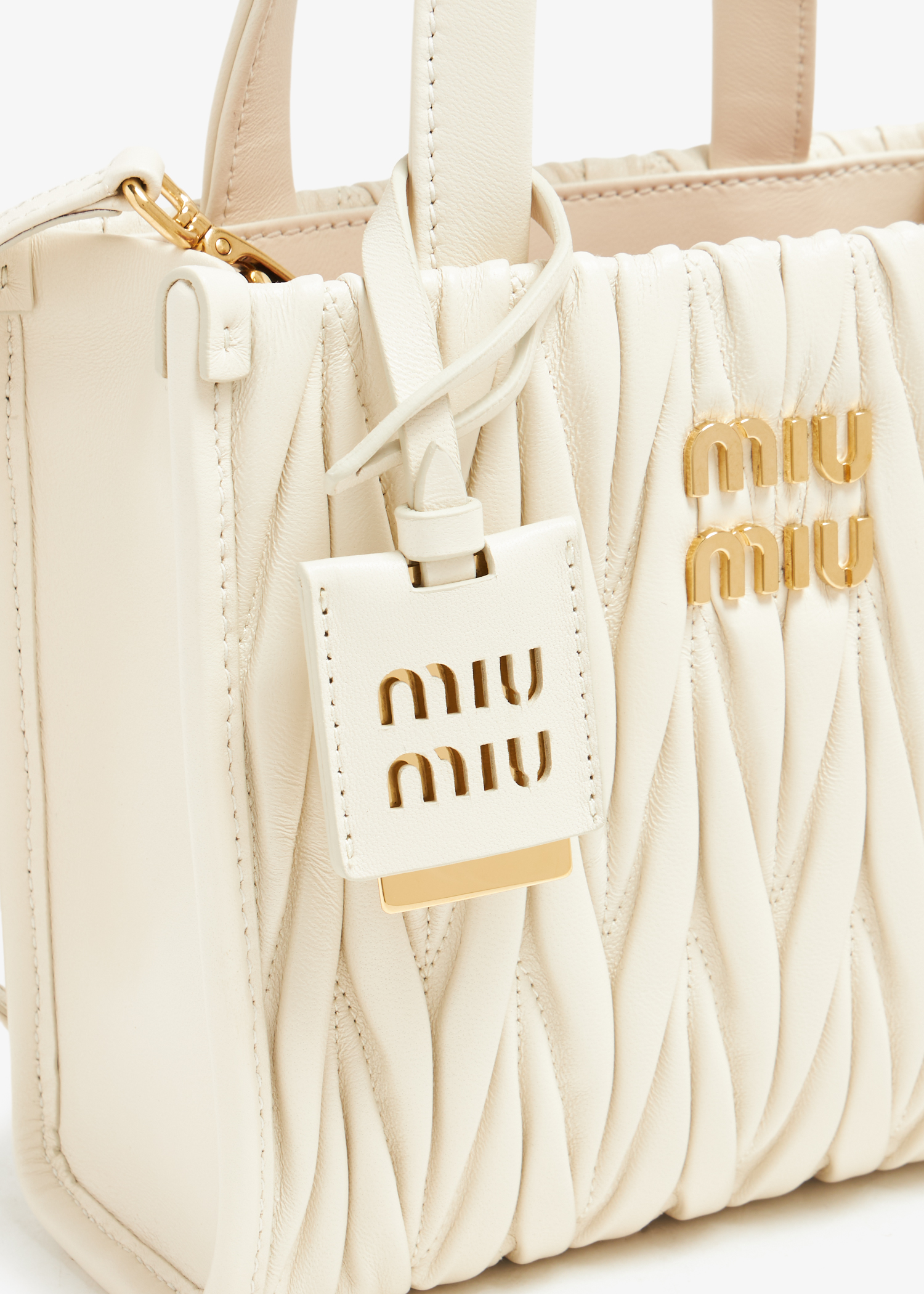 

Matelassé leather handbag, White