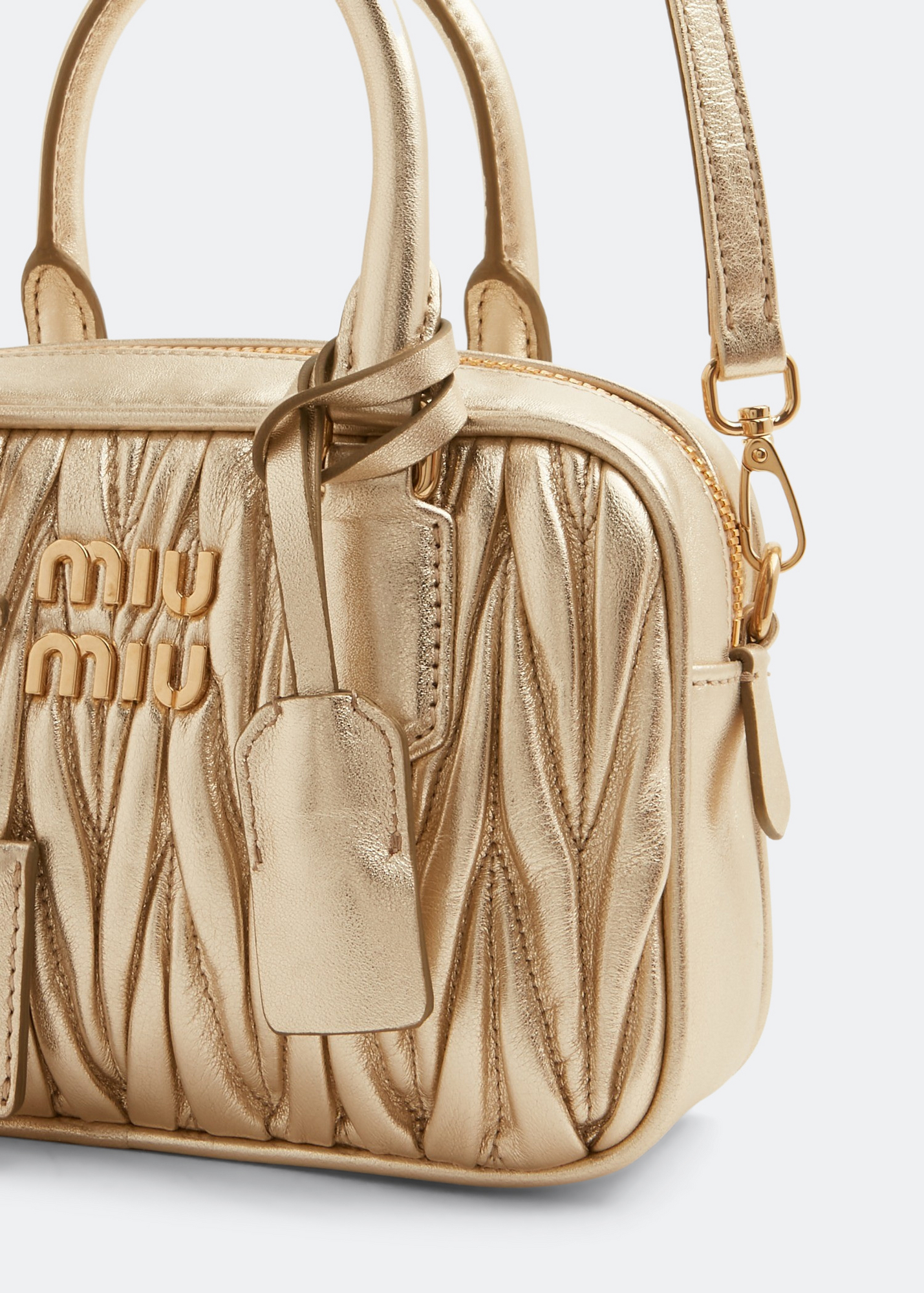 

Matelassé leather top handle bag, Gold