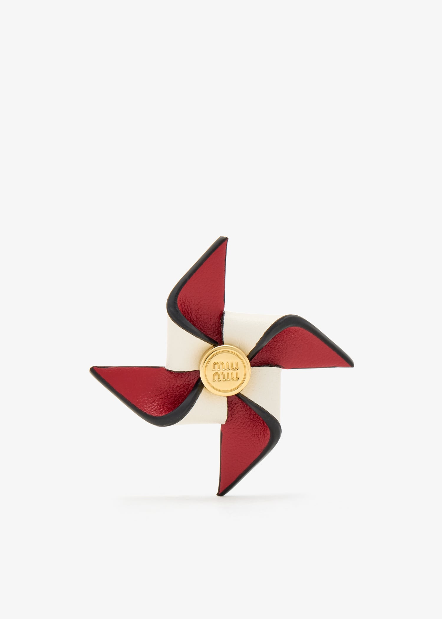 

Leather pinwheel brooch, Red
