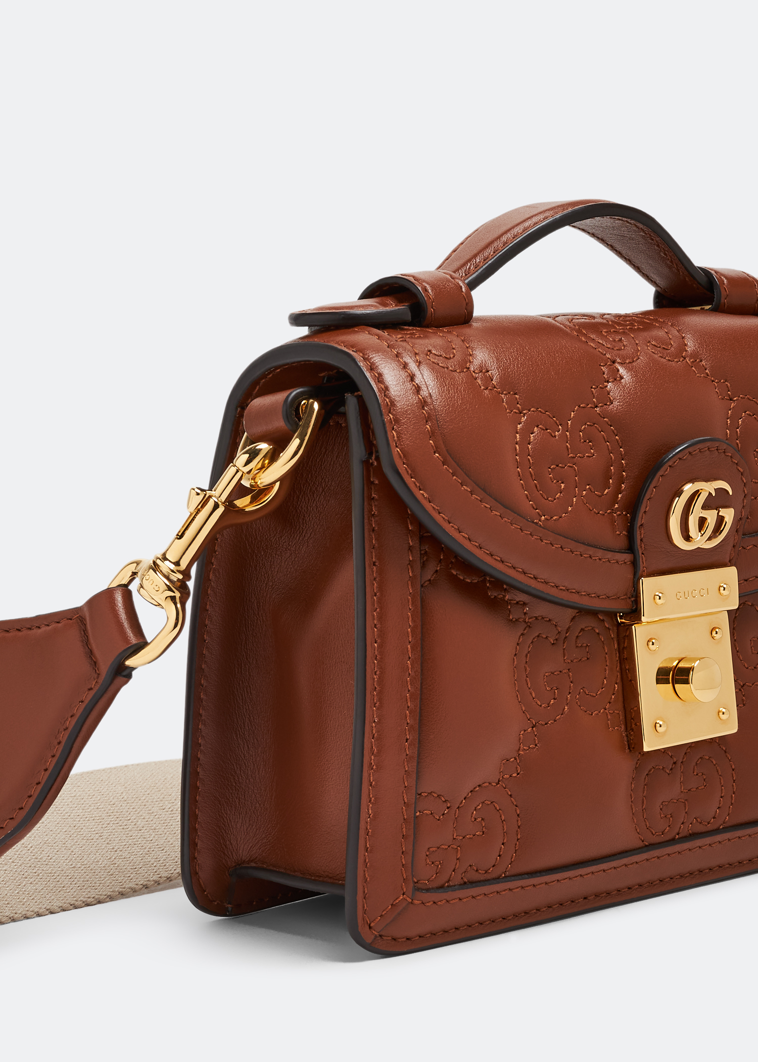

GG matelassé small top handle bag, Brown