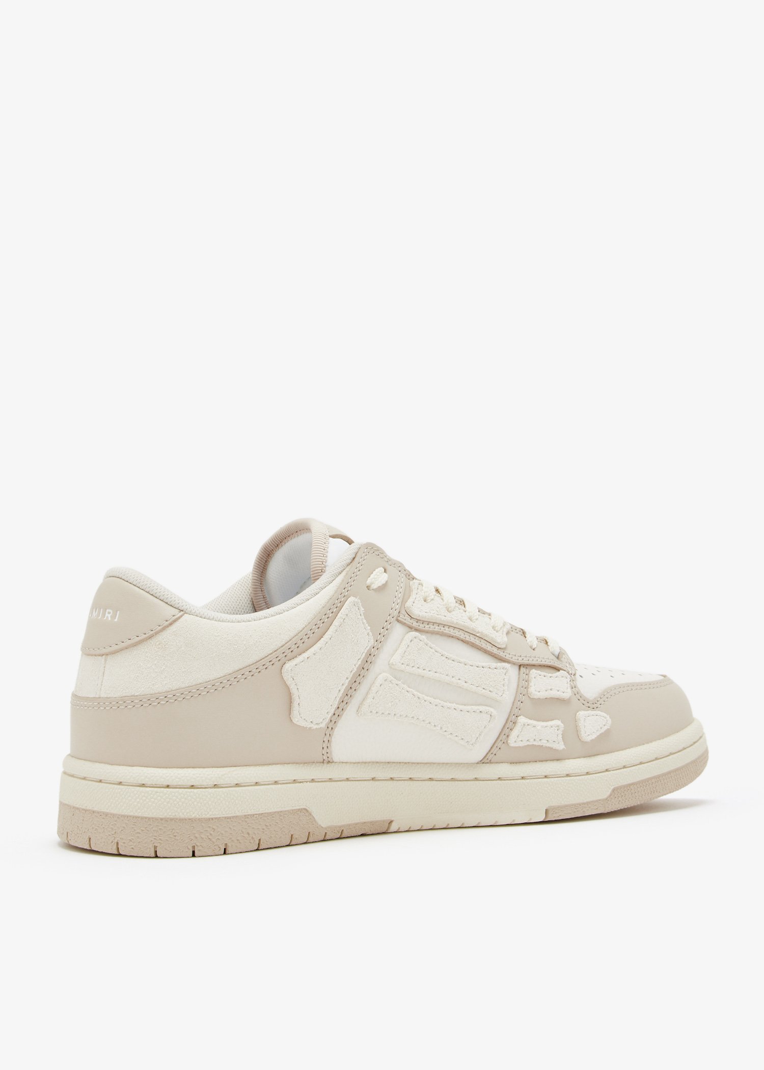 Chunky Skel leather low-top sneakers in beige - Amiri