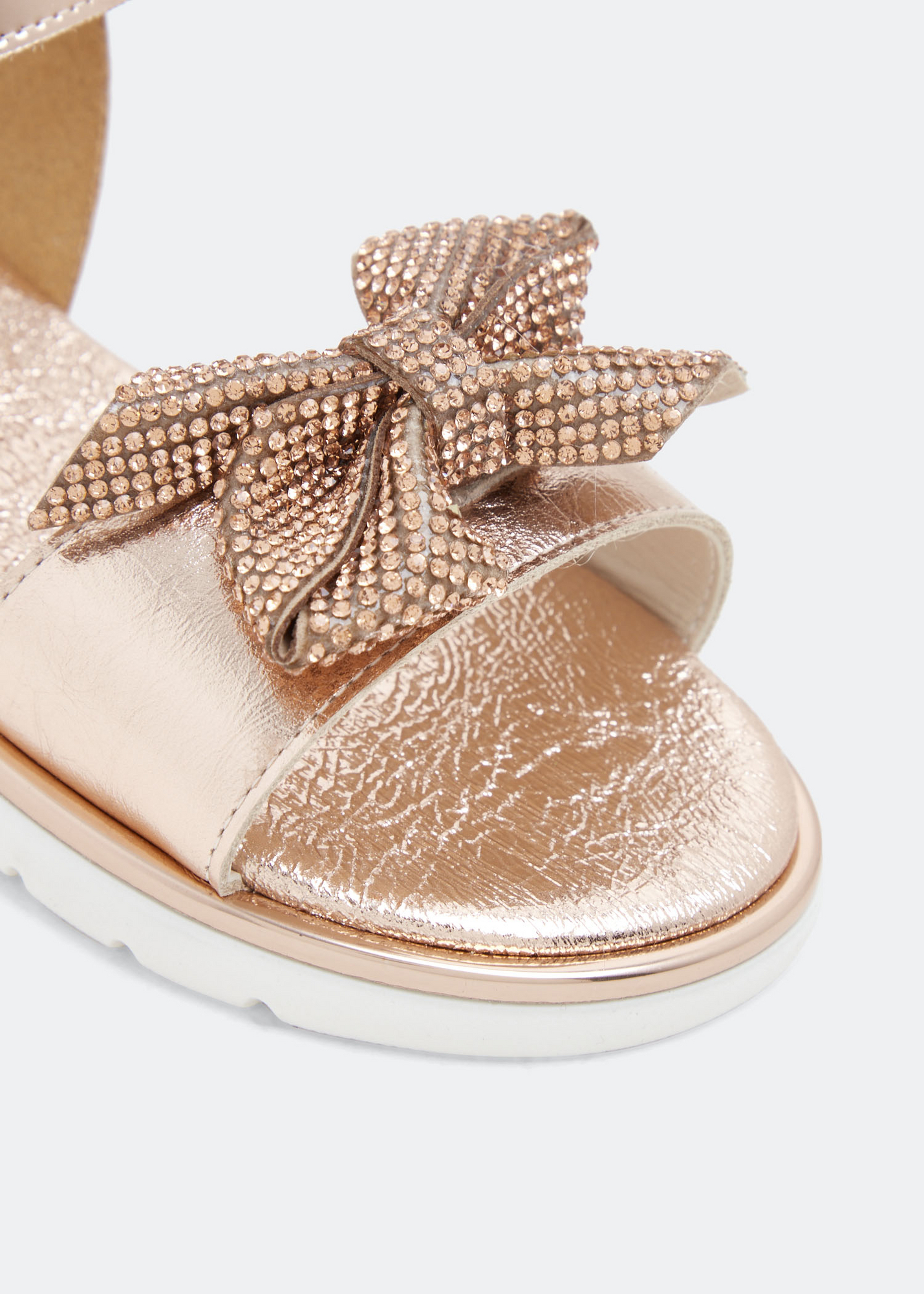 

Metallic bow sandals