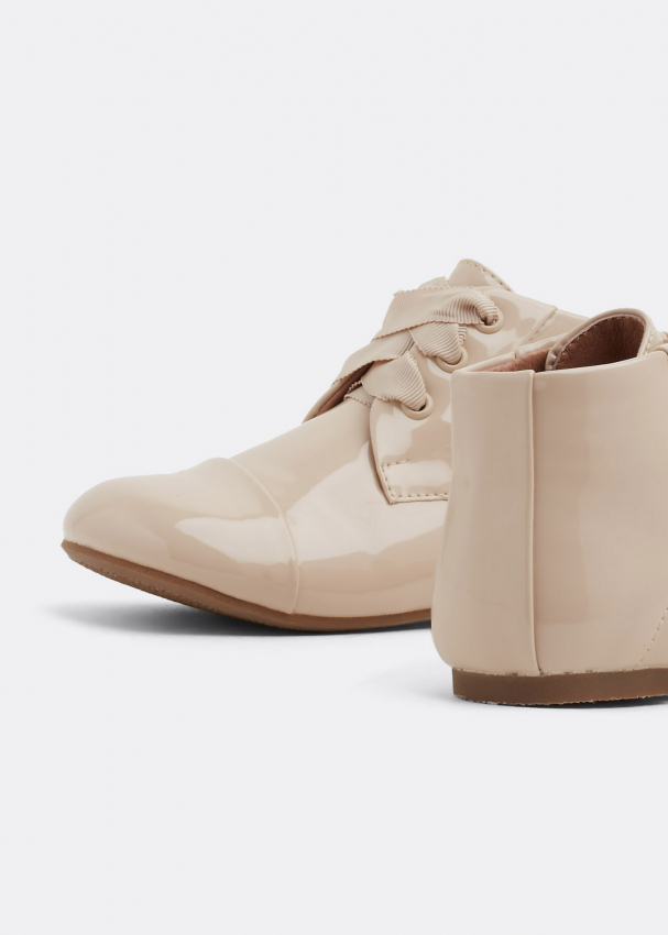 Age of innocence baby shoes store