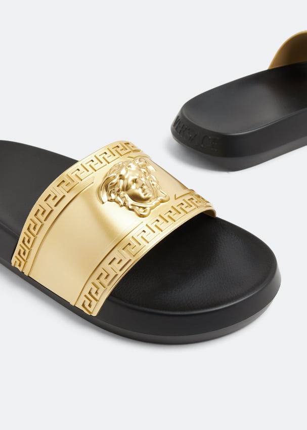 Versace La Medusa rubber slides for Men - Gold in UAE | Level Shoes
