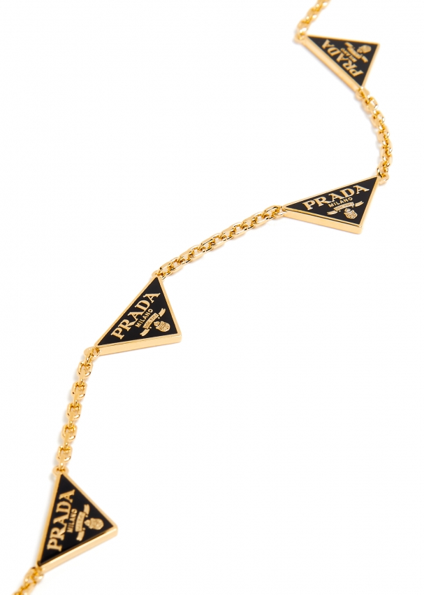 Prada Symbol Sliver Necklace at 1stDibs | prada necklace triangle, prada  triangle necklace, prada necklace triangle gold