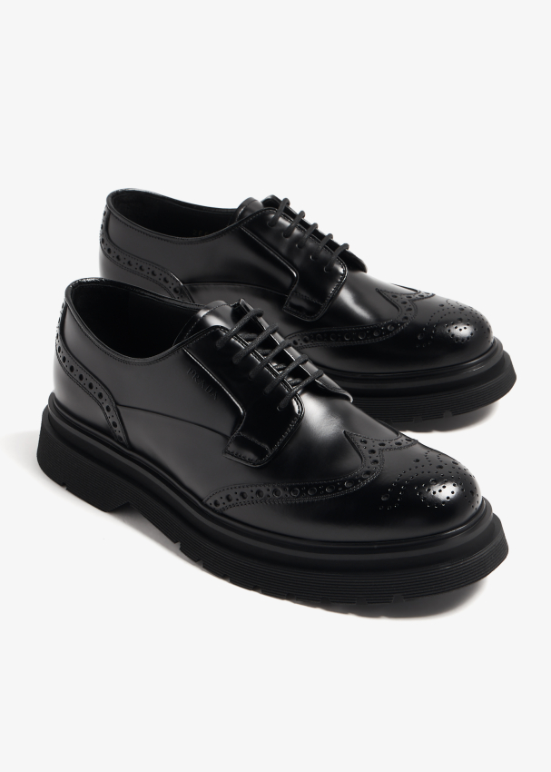 Prada Brushed Leather Derby brogue shoes for Men - Black in UAE | Level ...