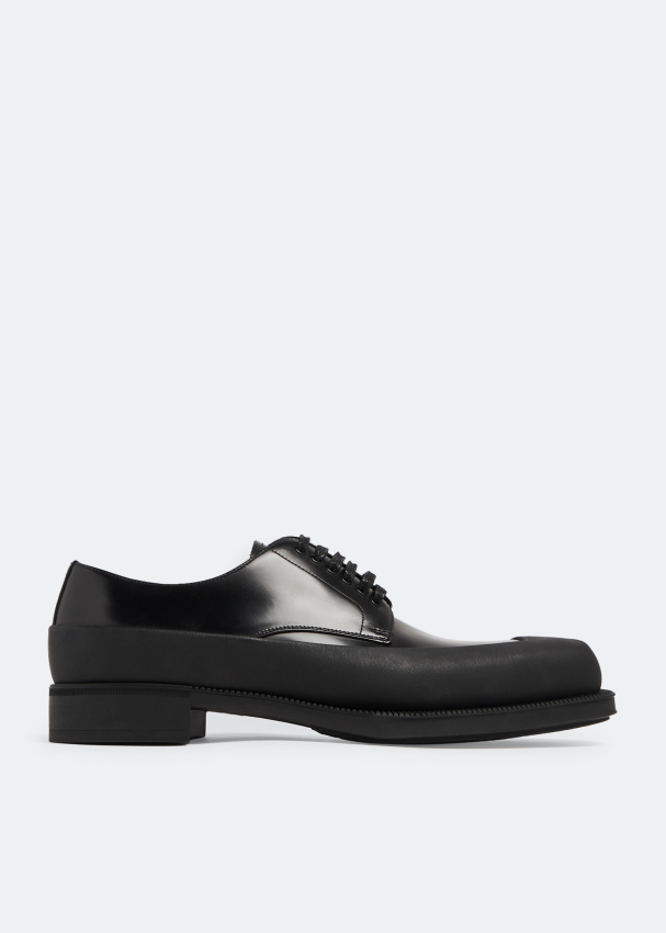 Prada Brushed leather Derby shoes for Men - Black in UAE | Level Shoes