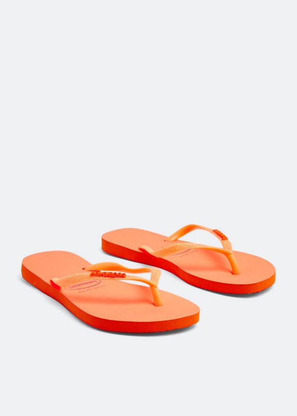 Neon orange flip flops shop