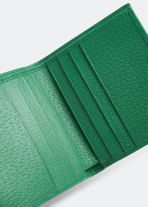 GUCCI Bi-fold wallet in green GG fabric