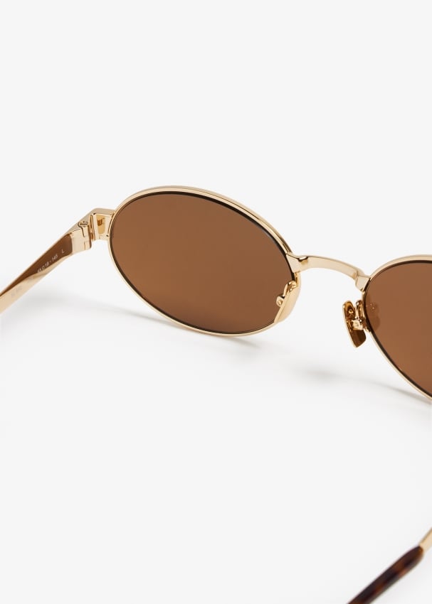 Oval top gold sunglasses