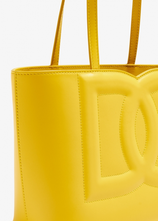 Yellow logo rubber tote top