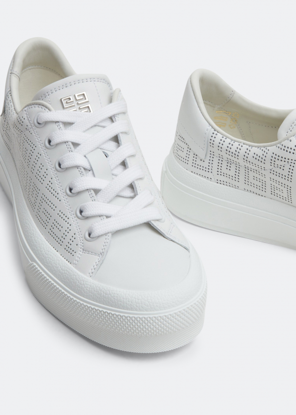 Givenchy perforated low sneakers on sale in leather