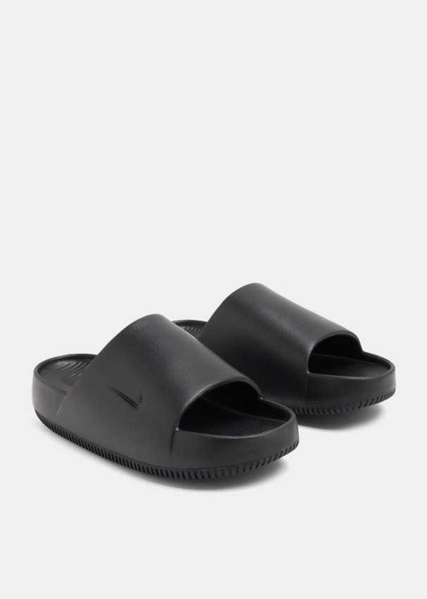 Plain black nike slides outlet