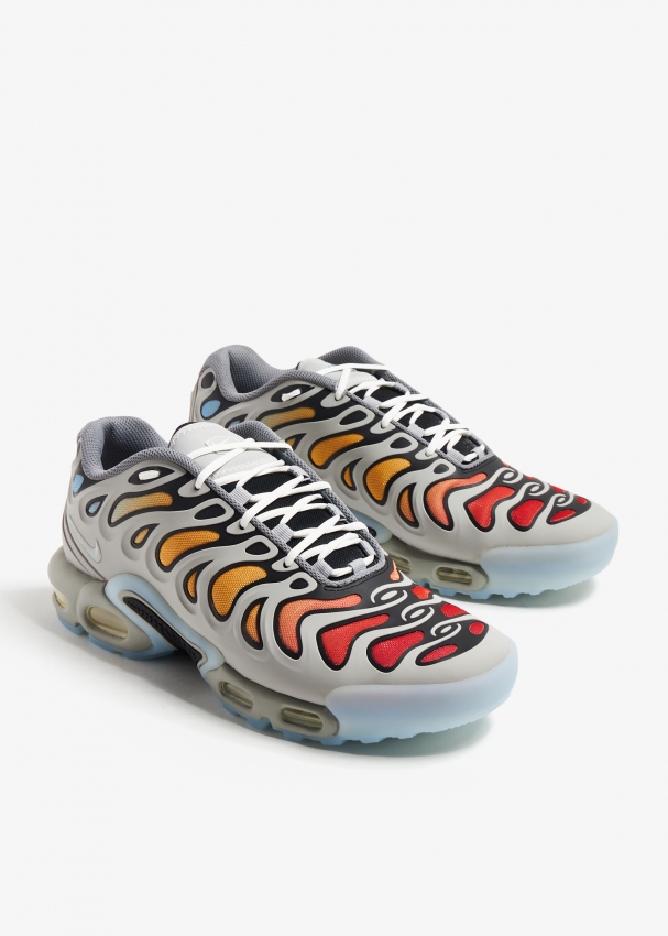 green and orange nike air max plus