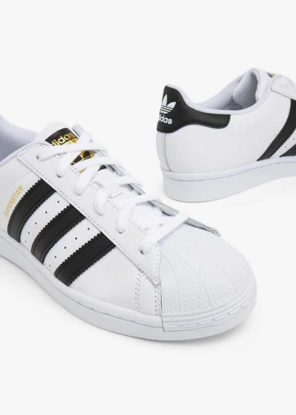 adidas Originals Superstar sneakers in black and white