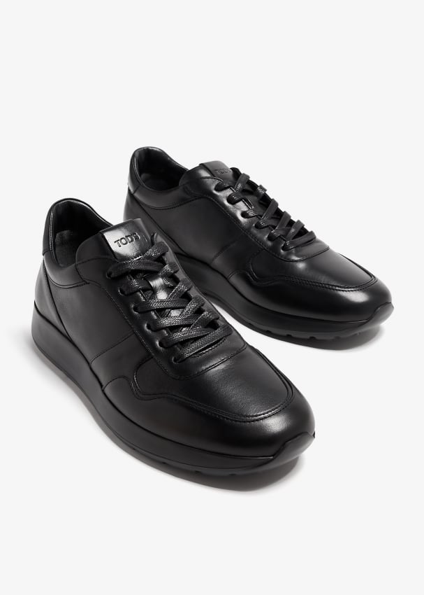 Tod's black leather sneakers on sale