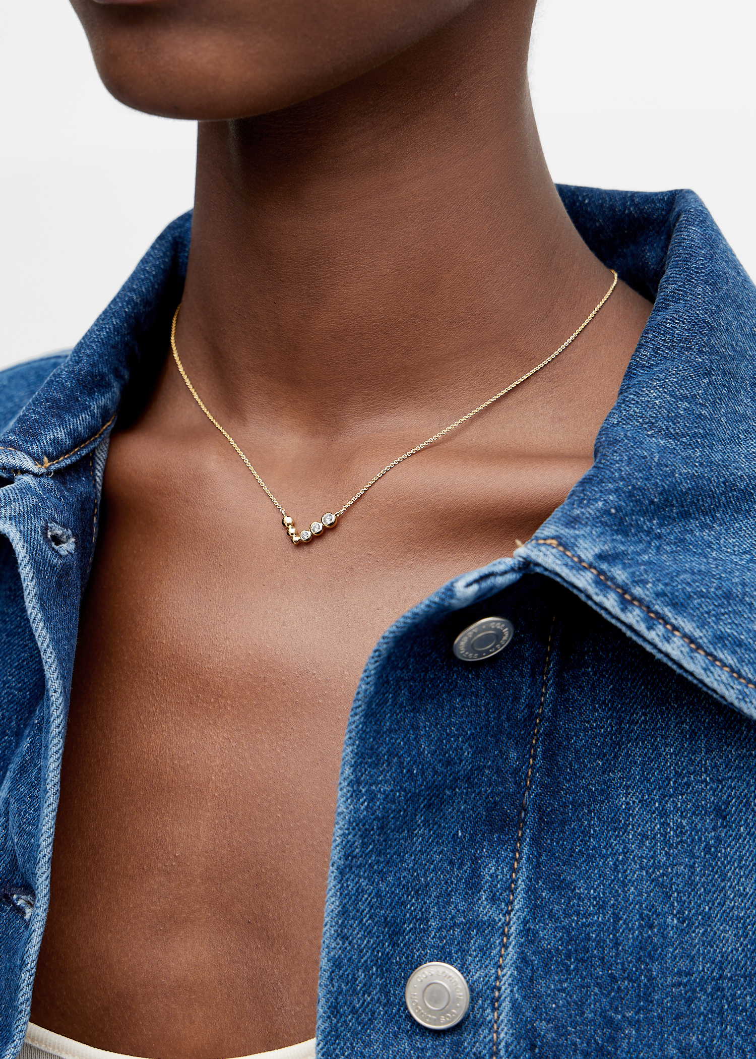 

Articulated reversible beaded stone floating necklace, Gold