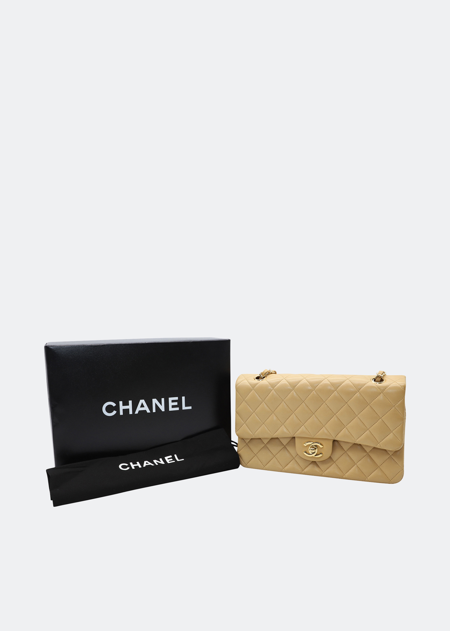 

Chanel Classic Double Flap Bag in Beige Lambskin Leather