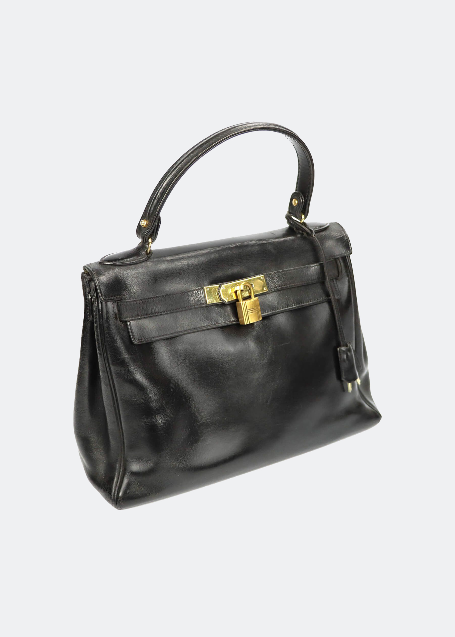 

Kelly 28 bag in black box calf leather with gold hardware